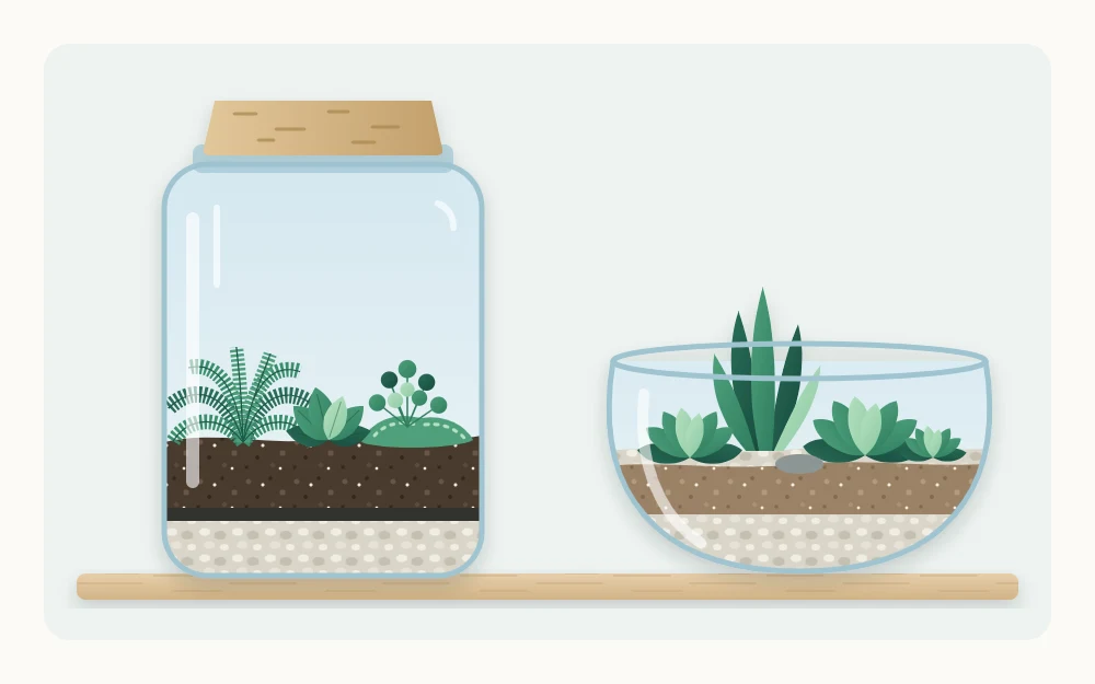 Clear glass jar terrarium with cork lid, pebble and dark mix layers, three tiny leafy plants and moss, beside an open glass bowl of small plants